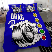 A blue bedding set with a drag racing graphic, including a duvet cover and two matching pillowcases, styled on a bed in a modern bedroom setting.