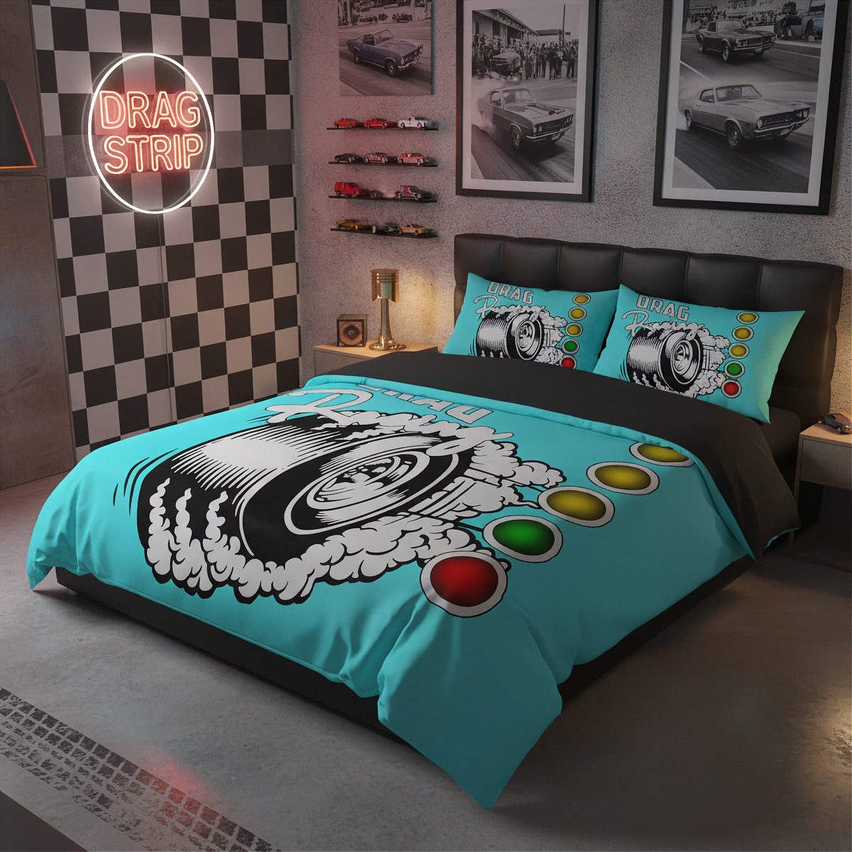 A bed dressed in a turquoise and black racing-themed bedding set, featuring a large tire graphic, smoke effects, and red, yellow, and green button details. The room has a checkered wall, framed car photos, and a neon-style 'DRAG STRIP' sign.