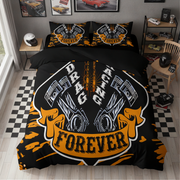 A black bedding set with a bold drag racing graphic, featuring two pillowcases and a duvet cover. The design displays two metallic pistons, a chain, and the words 'DRAG RACING' and 'FOREVER' in white and orange.