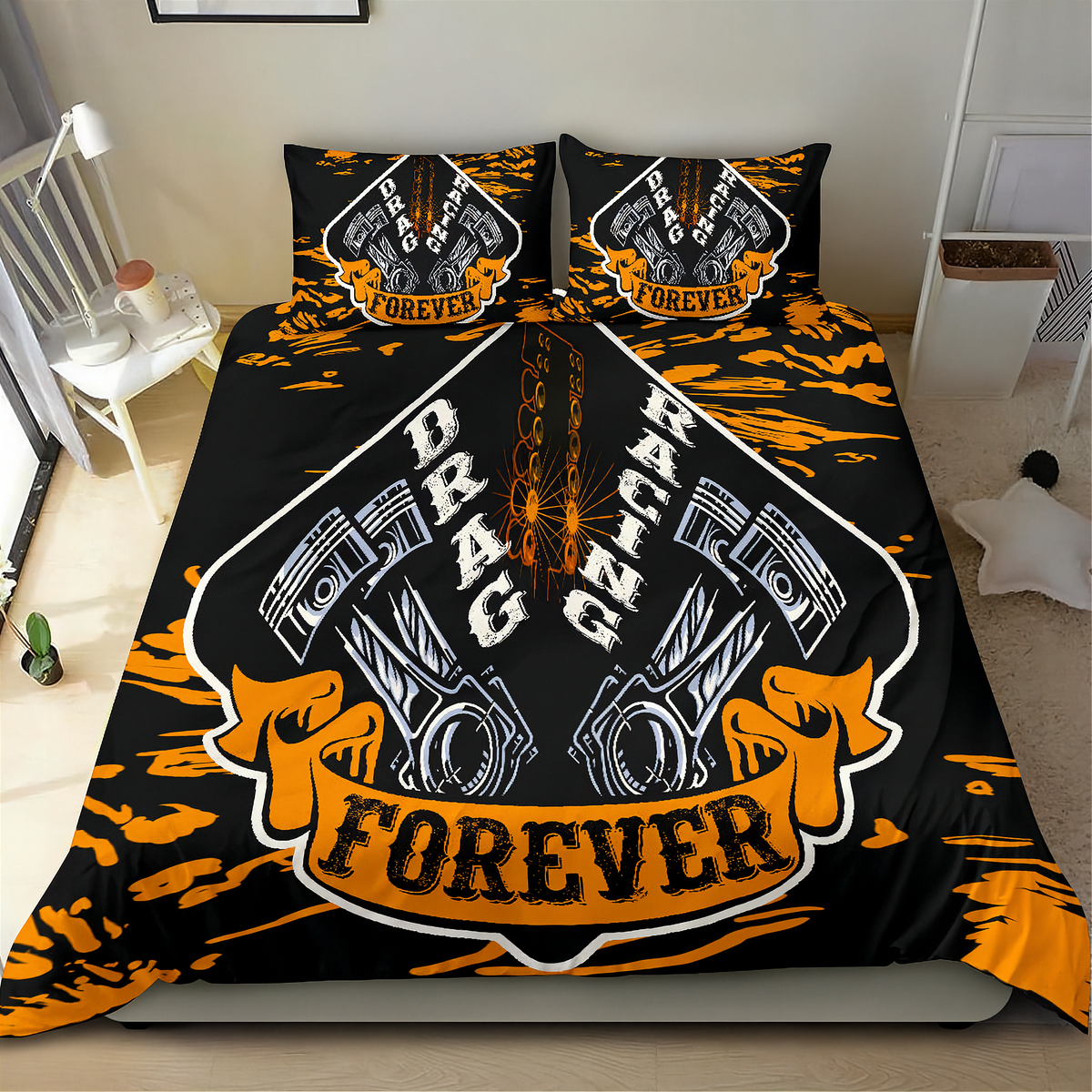 A bedding set featuring a duvet cover and two pillowcases with a bold drag racing graphic. The design displays two pistons, a chain, and the words 'DRAG RACING FOREVER' in black, white, and bright orange on a black background, styled on a bed in a bedroom setting.