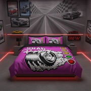 A bedroom setup featuring a bed dressed in a bright pink racing-themed bedding set with a large tire graphic and track number print. The room has gray walls, framed car posters, two gray nightstands, red LED lighting strips, and a digital stopwatch on the headboard.