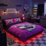 A purple and black garage racing themed bedding set with a tire graphic, styled in a dark gray gaming room with checkered floor, racing decor, and red ambient lighting.