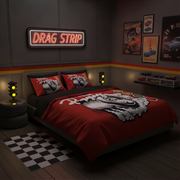 A styled bedroom scene featuring a red and black drag strip themed bedding set on a bed, with matching red pillows. The room has a dark gray wall with a neon 'DRAG STRIP' sign, vintage car posters, toy cars on a shelf, and a checkered rug on the floor.