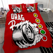 A red bedding set with a drag racing graphic, including a duvet cover and two matching pillowcases, styled on a bed in a modern bedroom setting.