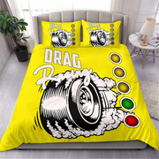 Bright yellow drag racing themed bedding set including a duvet cover and two pillowcases, displayed on a bed in a modern bedroom setting.