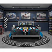 A racing-themed bedding set displayed on a bed in a styled bedroom. The comforter and matching pillow shams feature a bold black, blue, and gray design with checkered flags, tire tracks, and a central red, yellow, and blue race car graphic.