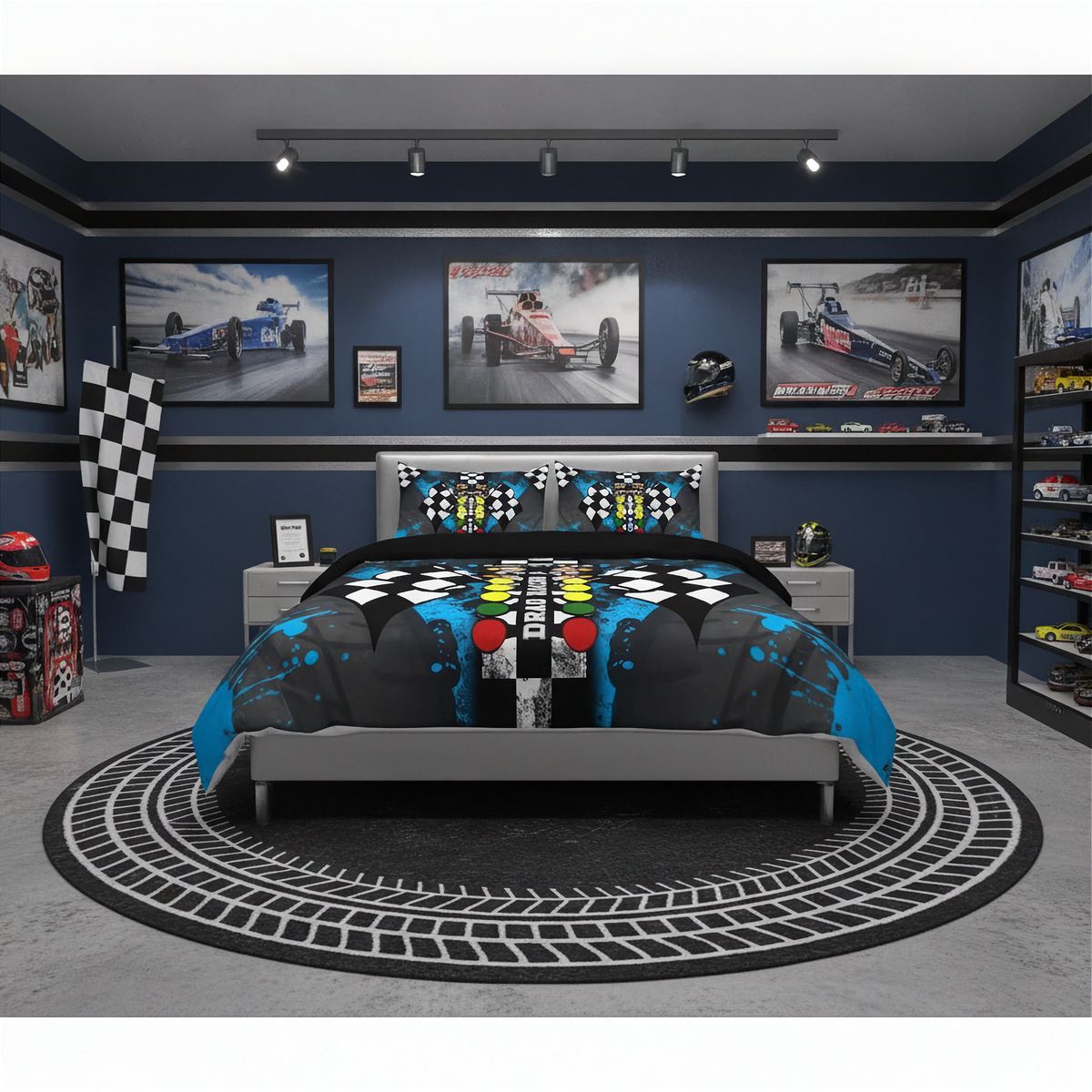 A racing-themed bedding set displayed on a bed in a styled bedroom. The comforter and matching pillow shams feature a bold black, blue, and gray design with checkered flags, tire tracks, and a central red, yellow, and blue race car graphic.