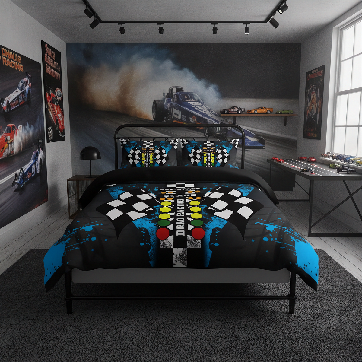 A racing-themed bedding set displayed on a bed in a modern, dark-themed bedroom. The set includes a duvet cover and two matching pillowcases featuring a graphic design of a drag race car, checkered flags, a finish line, and blue paint splatters on a black background.