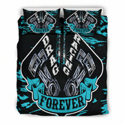 A bedding set featuring a duvet cover and two matching pillowcases with a bold drag racing graphic design. The design features a black background with teal paint splatters and a large central shield graphic containing pistons, flames, and the text 'DRAG RACING FOREVER'.