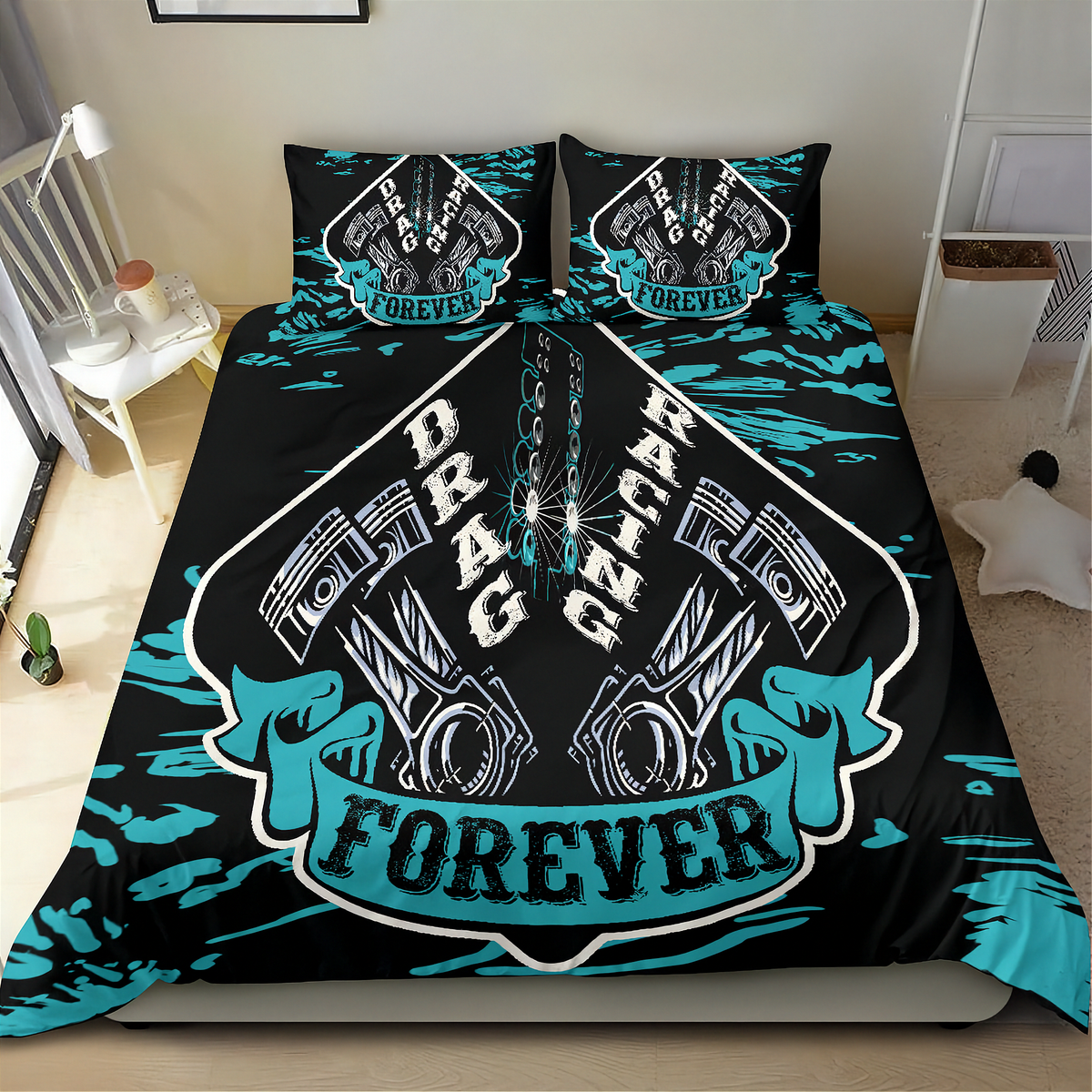 A bed dressed in a black bedding set with a bold racing graphic featuring teal and white. The design includes the words 'DRAG RACING FOREVER' and an engine pistons motif, with matching pillowcases visible in a bedroom setting.