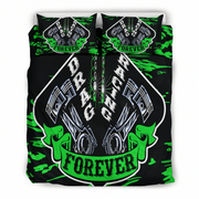 A bedding set featuring a duvet cover and two matching pillowcases with a bold 'Drag Racing Forever' graphic design. The design features a black background with bright green paint splatters, a large central shield containing two silver pistons and the words 'DRAG RACING', and green claw hands holding a banner that reads 'FOREVER'.
