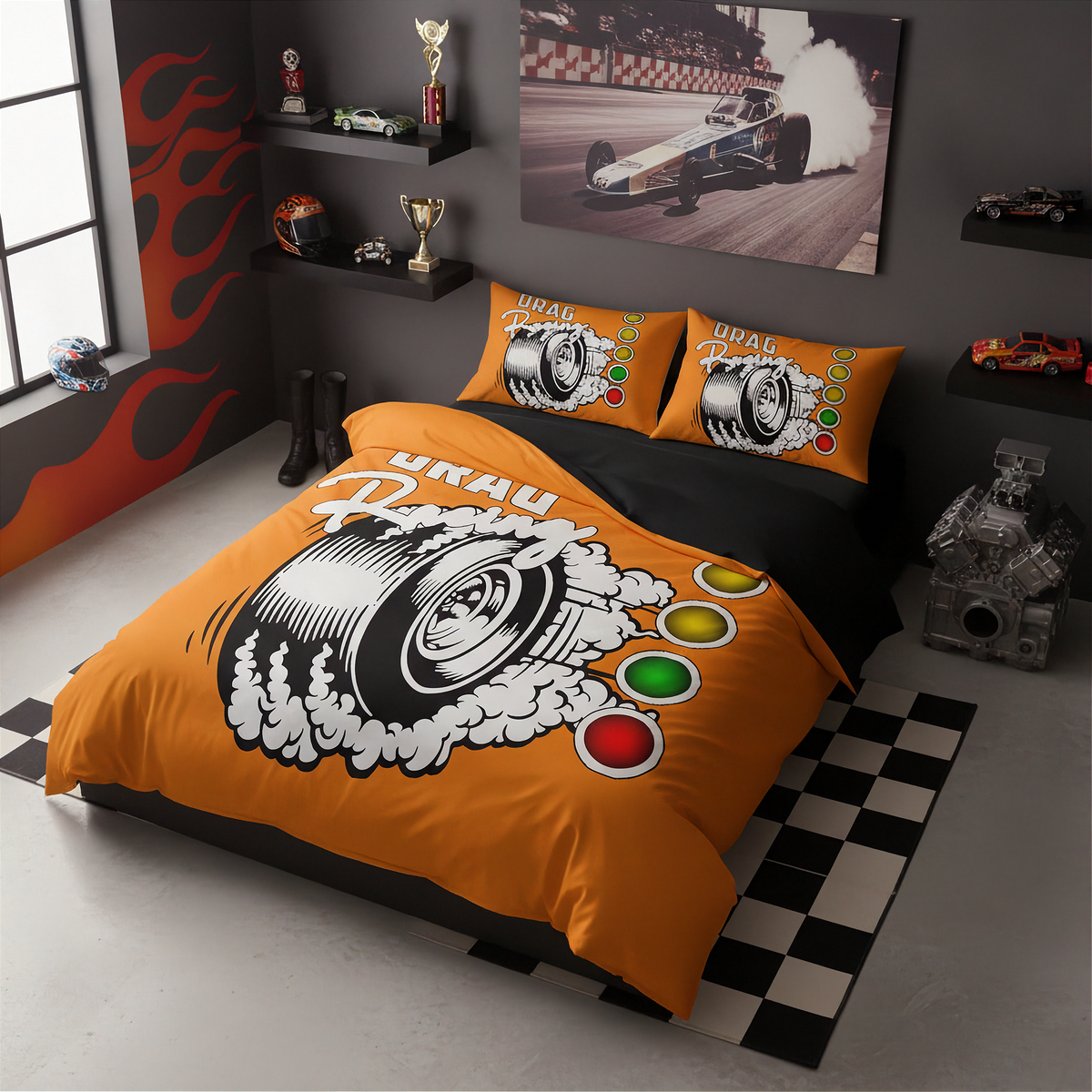 An orange and black racing-themed bedding set with a large piston graphic and the word 'URAU' on the duvet cover, shown on a bed in a dark gray racing-style bedroom with checkered floor and race car wall art.