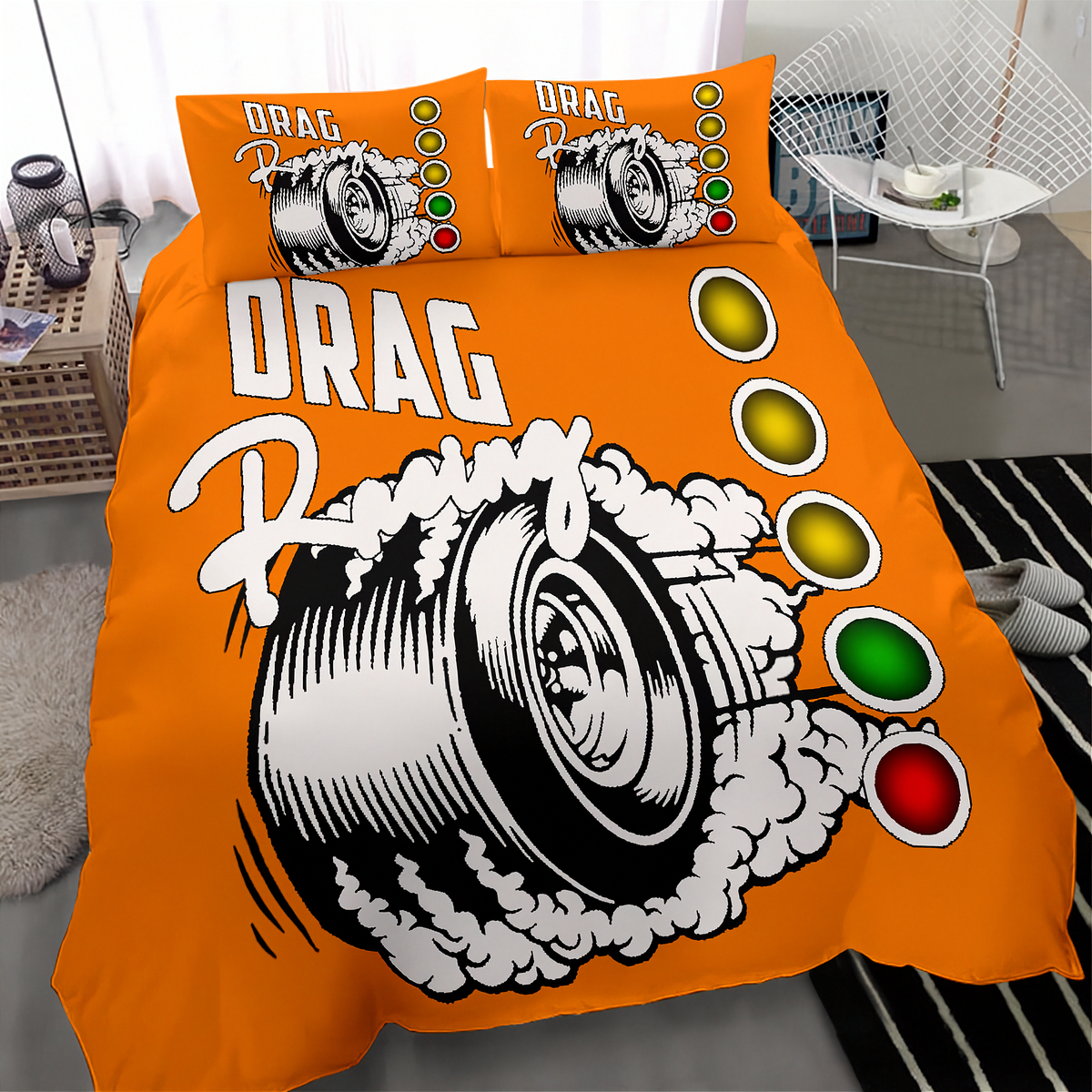 Bright orange bedding set with a drag racing graphic, including a duvet cover and two matching pillowcases, styled in a modern bedroom setting.