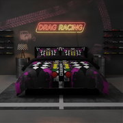 A bed dressed in a drag racing themed bedding set with a black, white, and purple checkered pattern, styled in a dark gray bedroom with a neon 'DRAG RACING' sign on the wall.