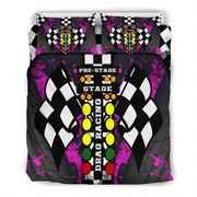A racing-themed bedding set featuring a duvet cover and two pillowcases with a black, white, and purple checkered flag design, yellow and orange race lights, and the words 'PRE-STAGE', 'STAGE', and 'DRAG RACING'.