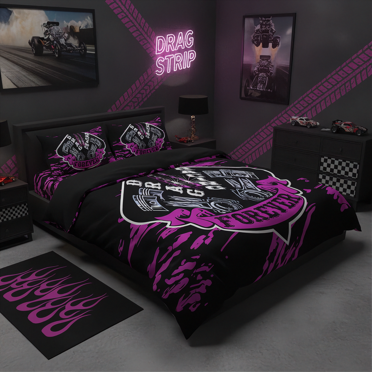 A black and pink drag strip themed bedding set displayed on a bed in a dark gray bedroom. The set includes a duvet cover and two matching pillowcases with a large 'Drag Strip Racing' shield logo and pink flames.