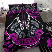A bedding set featuring a black duvet cover and matching pillowcases with a bold 'Drag Racing Forever' graphic design in pink, white, and black, styled on a bed in a modern bedroom setting.