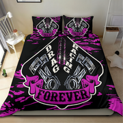 A bed dressed with a black racing-themed bedding set featuring a large pink and white 'BRAGGING FOREVER' graphic with pistons and chains, shown in a bedroom setting.