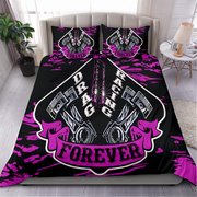 A bedding set displayed on a bed in a styled bedroom, featuring a black duvet cover and two matching pillowcases with a bold pink and white 'BRAGS RACING FOREVER' graphic design.