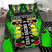 A bedding set featuring a duvet cover and two pillowcases with a vibrant drag racing theme. The design includes a black and neon green paint-splatter background, a large white 'PRE-STAGE STAGE DRAG RACING' graphic, and yellow, green, and red oval light motifs.