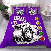 A purple drag racing themed bedding set featuring a duvet cover and two matching pillowcases with a graphic of a spinning tire, smoke, and traffic light symbols, displayed on a bed in a modern bedroom setting.