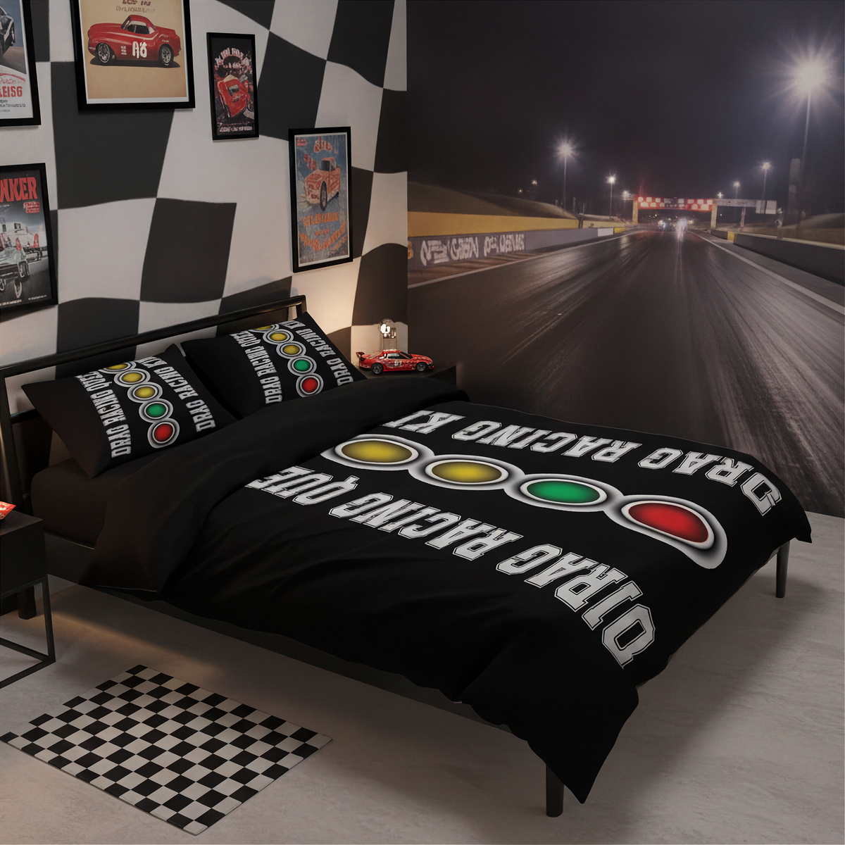 A racing-themed bedding set displayed on a bed in a styled bedroom. The set includes a black duvet cover and matching pillowcases printed with white 'DRAG RACING QUEEN' text and three signal lights in yellow, green, and red.