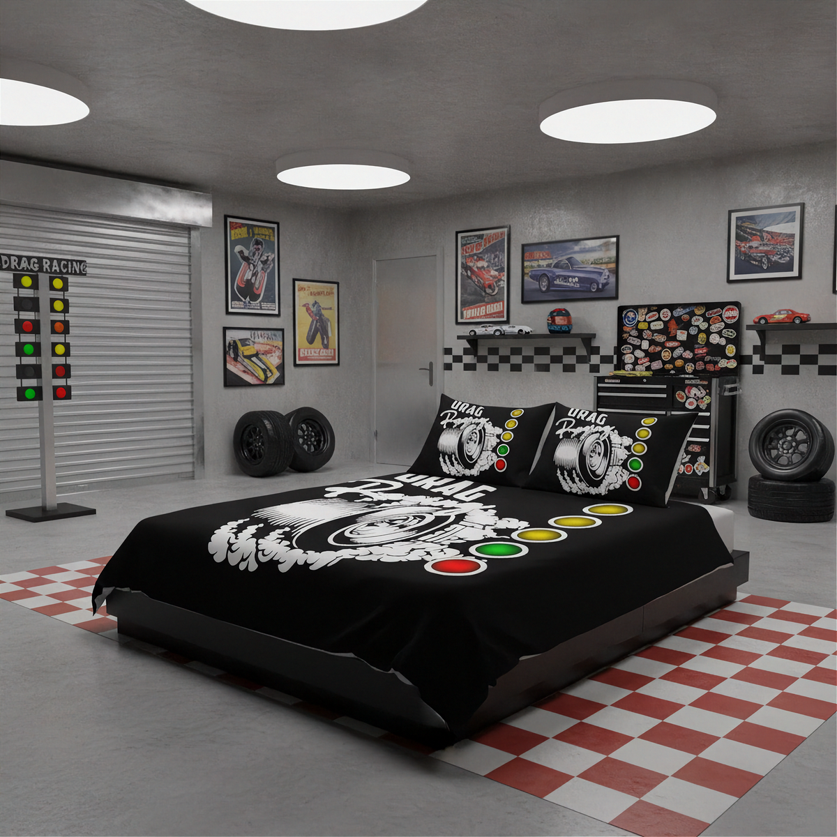 A racing-themed bedroom setup featuring a black duvet cover and matching pillowcases with a white graphic of a race car and the words 'DRAG RACING'. The room is styled like a garage with gray walls, ceiling lights, racing posters, tires, and a red-and-white checkered floor mat.