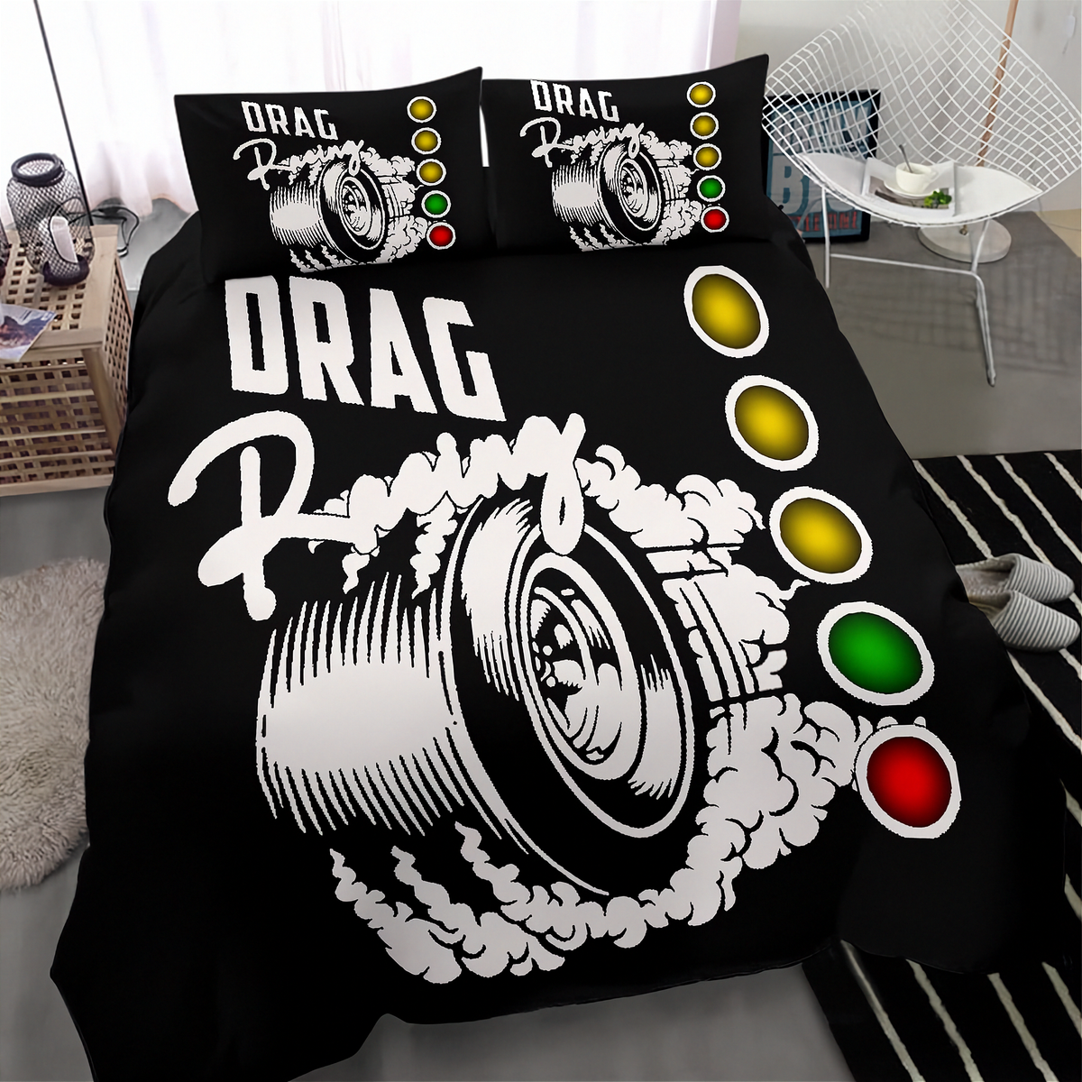 A black bedding set with a bold drag racing graphic, including a duvet cover and two matching pillowcases, styled on a bed in a modern bedroom setting.
