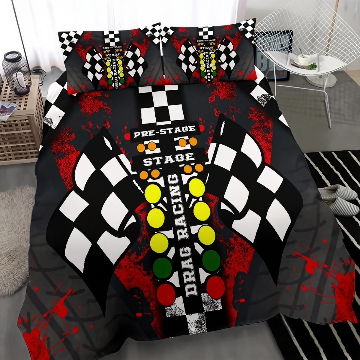A racing-themed bedding set featuring a duvet cover and two matching pillowcases with a black and white checkered flag design, red paint splatters, and colorful race lights on a bed in a modern bedroom setting.