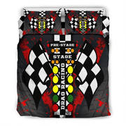 A racing-themed bedding set featuring a duvet cover and two pillowcases with a bold drag racing graphic. The design includes black and white checkered flags, a vertical 'DRAG RACING' text motif, a yellow race light sequence, and red paint splatter details on a dark gray background.