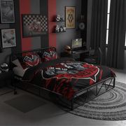 A black metal bed frame dressed in a red and black graphic duvet cover and matching pillowcases, styled in a dark, modern bedroom with racing and motorcycle-themed wall art.