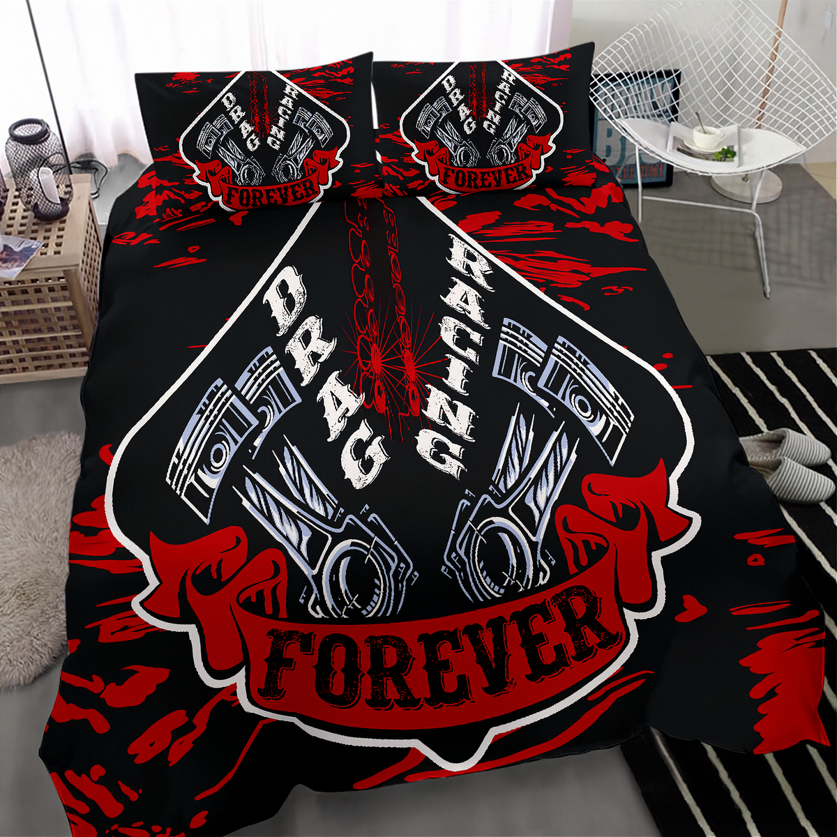 A black bedding set with a bold red and white drag racing graphic, featuring two matching pillowcases and a duvet cover with engine pistons and the words 'DRAG RACING FOREVER', shown on a bed in a modern bedroom setting.