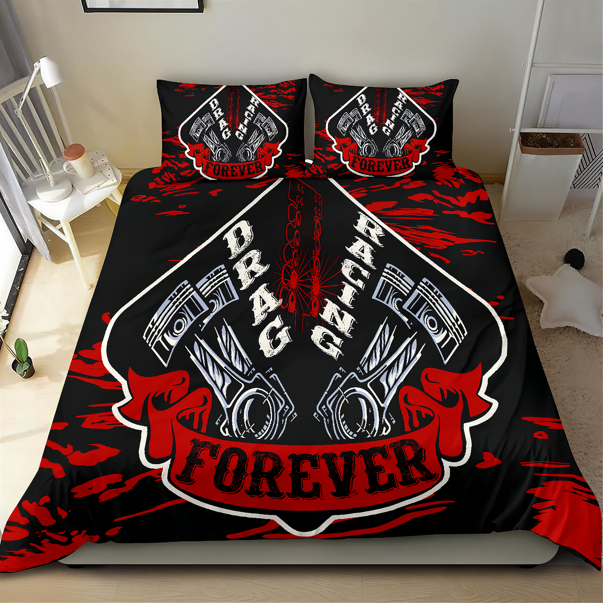 A black bedding set with a bold red and white drag racing graphic, including a duvet cover and two matching pillowcases, displayed on a bed in a modern bedroom setting.