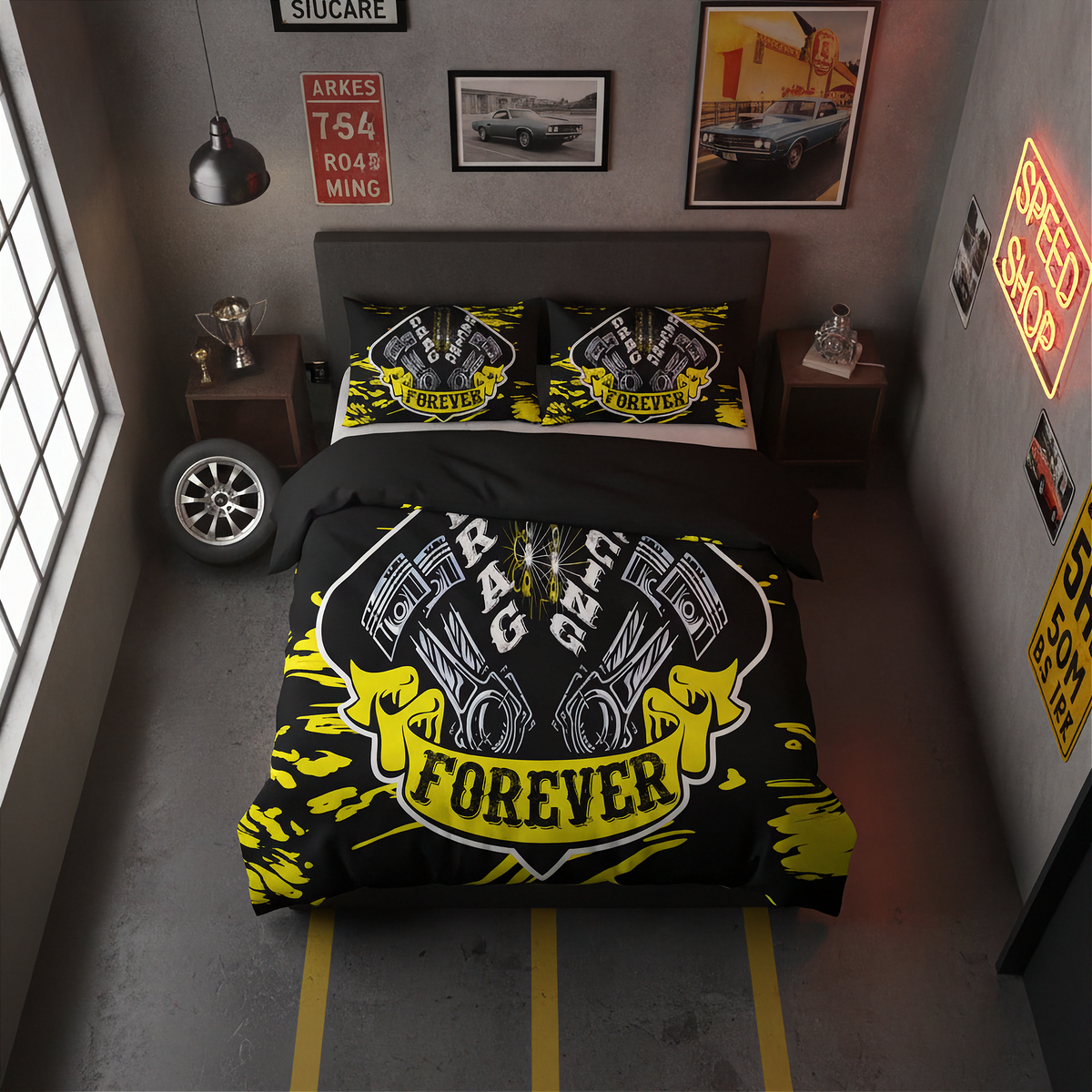 A styled bedroom scene showing a bed dressed in a black bedding set with a bold yellow and white racing graphic that reads 'Racing Forever' and 'Engine Forever.' The room has gray walls, framed wall art, a neon sign, a window, bedside tables, and a car wheel prop, making this a lifestyle/product-in-room presentation rather than a clean studio shot.