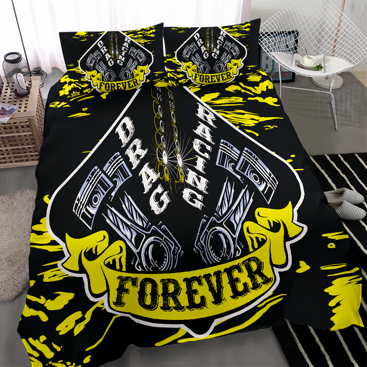A bedding set featuring a black duvet cover and two matching pillowcases with a bold yellow and white drag racing engine graphic design, styled in a modern bedroom setting.