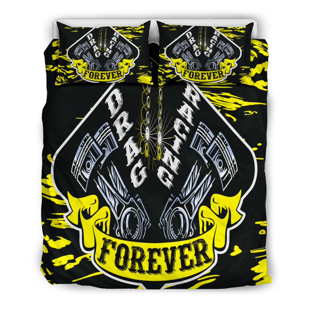 A bedding set featuring a duvet cover and two pillowcases with a bold 'Drag Racing Forever' graphic design. The design features metallic silver pistons, a chain, and yellow fists on a black background with yellow paint splatters.