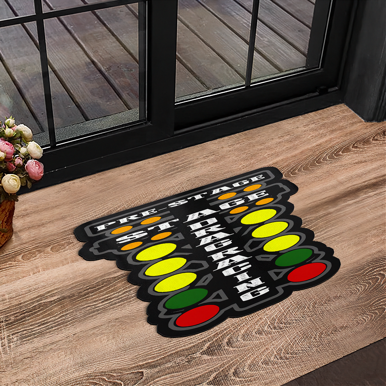 Doormat with traffic light design on a wooden floor