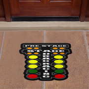 Doormat with 'Pre Stage Stage Drag Racing' text and traffic light design on a tiled floor.