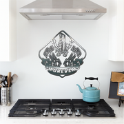 Decorative drag racing metal wall art above a stove in a kitchen