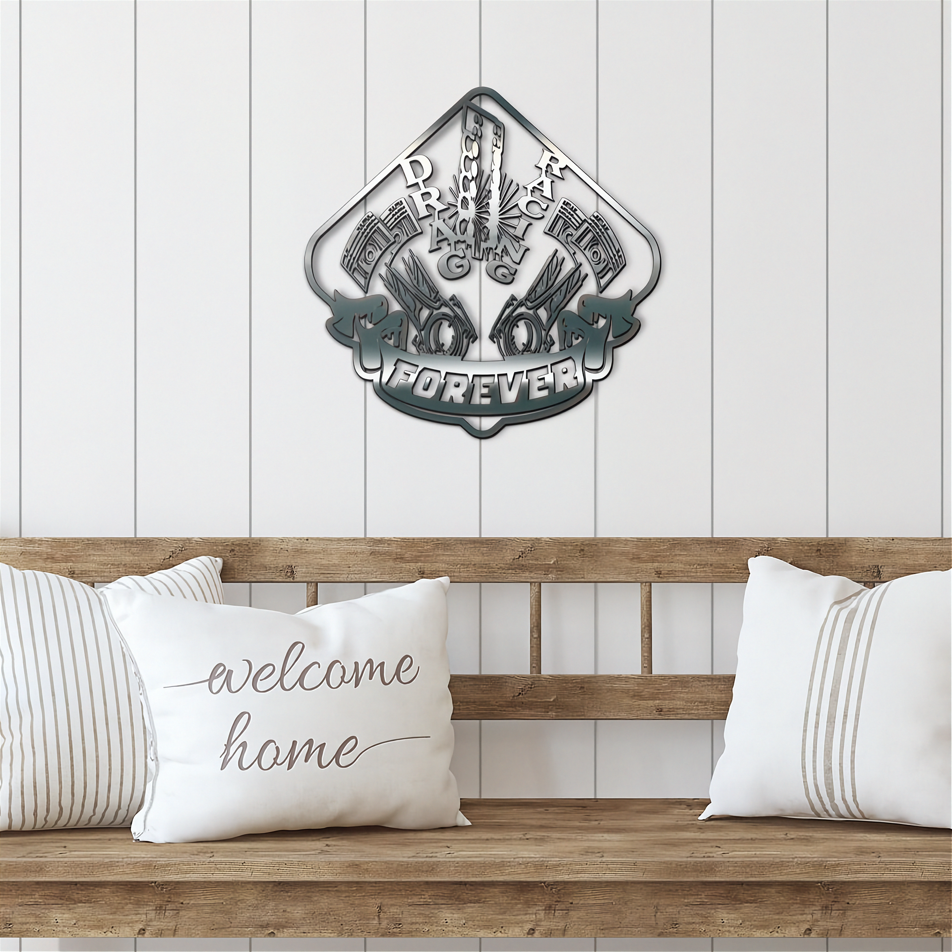 Decorative drag racing metal wall art above a wooden bench with pillows in a home setting.
