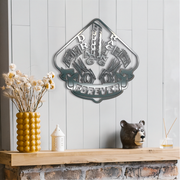 Decorative metal wall art with 'drag racing Forever' text on a wooden shelf with decorative items.
