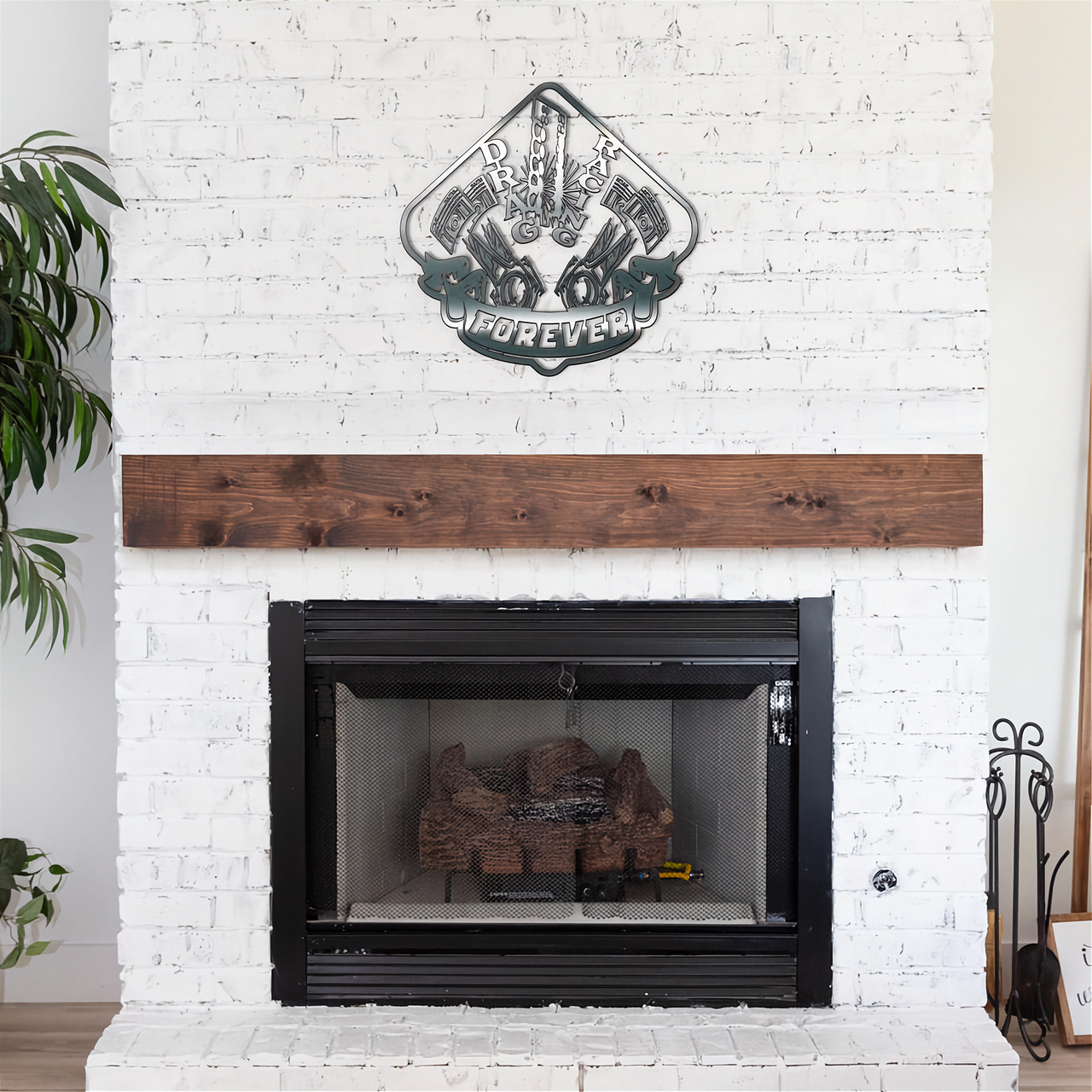 Fireplace with white brick wall, wooden mantel, and decorative drag racing metal sign above.
