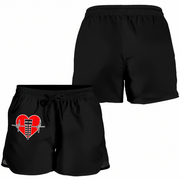 Two pairs of women's black athletic shorts shown on a plain white background. The top pair is shown from the back, and the bottom pair is shown from the front with a red and white heart-shaped graphic on the left leg.