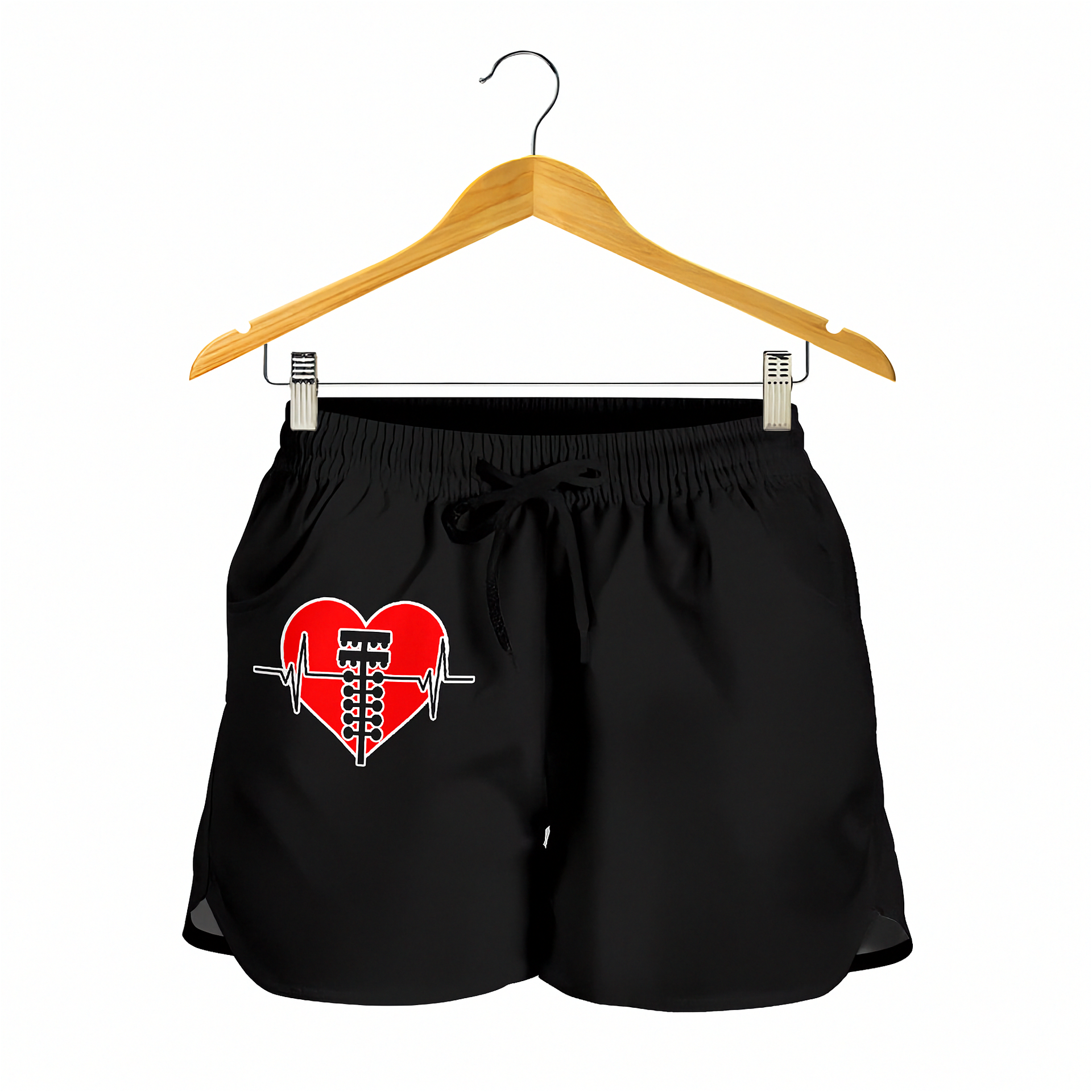 Black athletic shorts with a red heart and abacus graphic on the front, hanging from a wooden hanger against a white background.