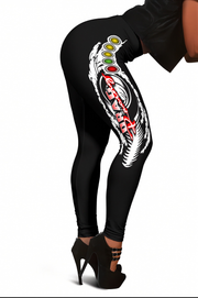 Black leggings with colorful graphic design on a white background