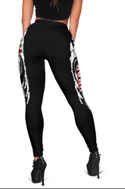 Black leggings with white and red designs on a white background