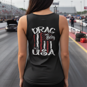 Person wearing a black tank top with 'Drag Racing Made in USA' design at a race track.