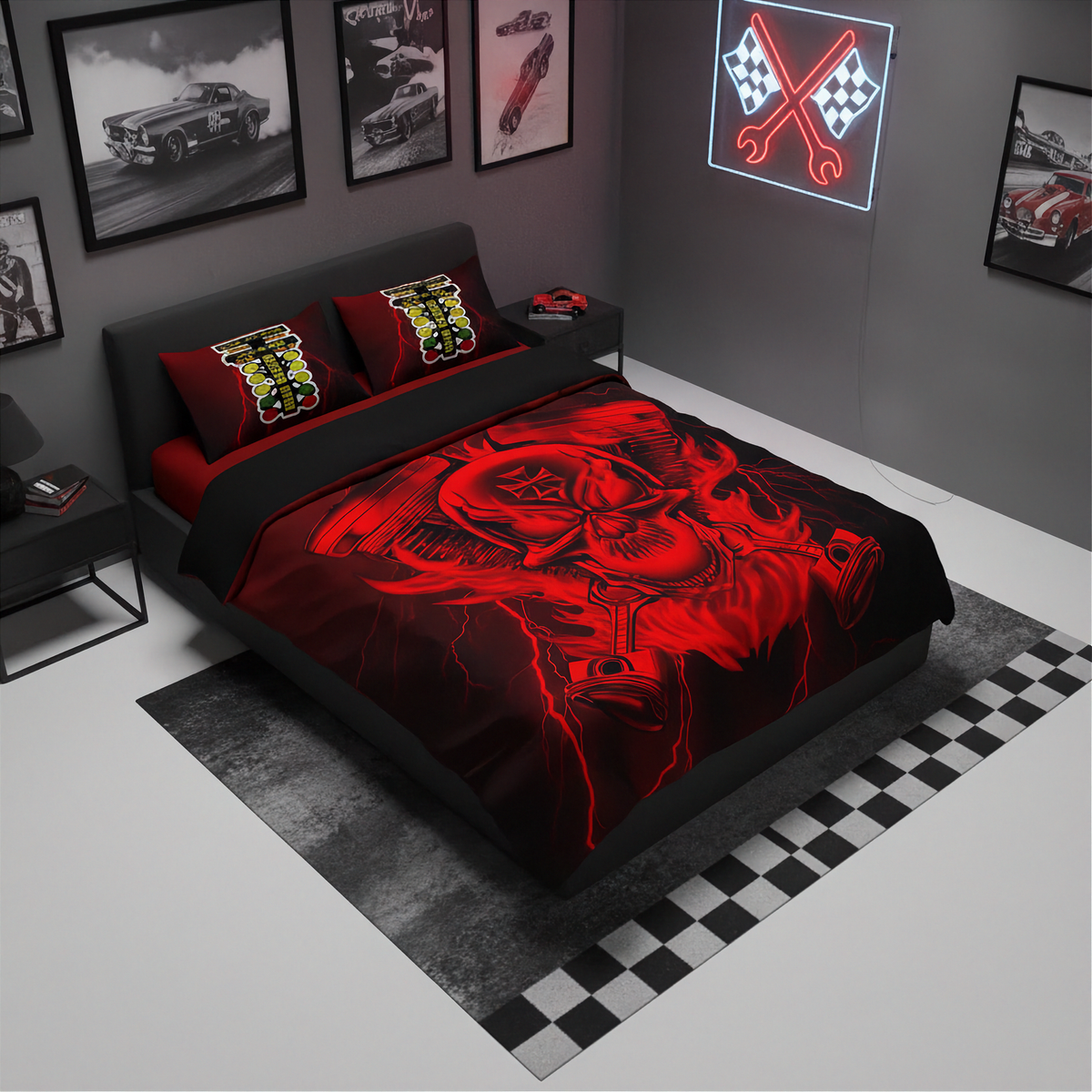 A bed dressed in a black and red racing-themed bedding set, featuring a large red skull graphic on the duvet and two matching red pillows with yellow and black stripes, shown in a modern gray bedroom setting.