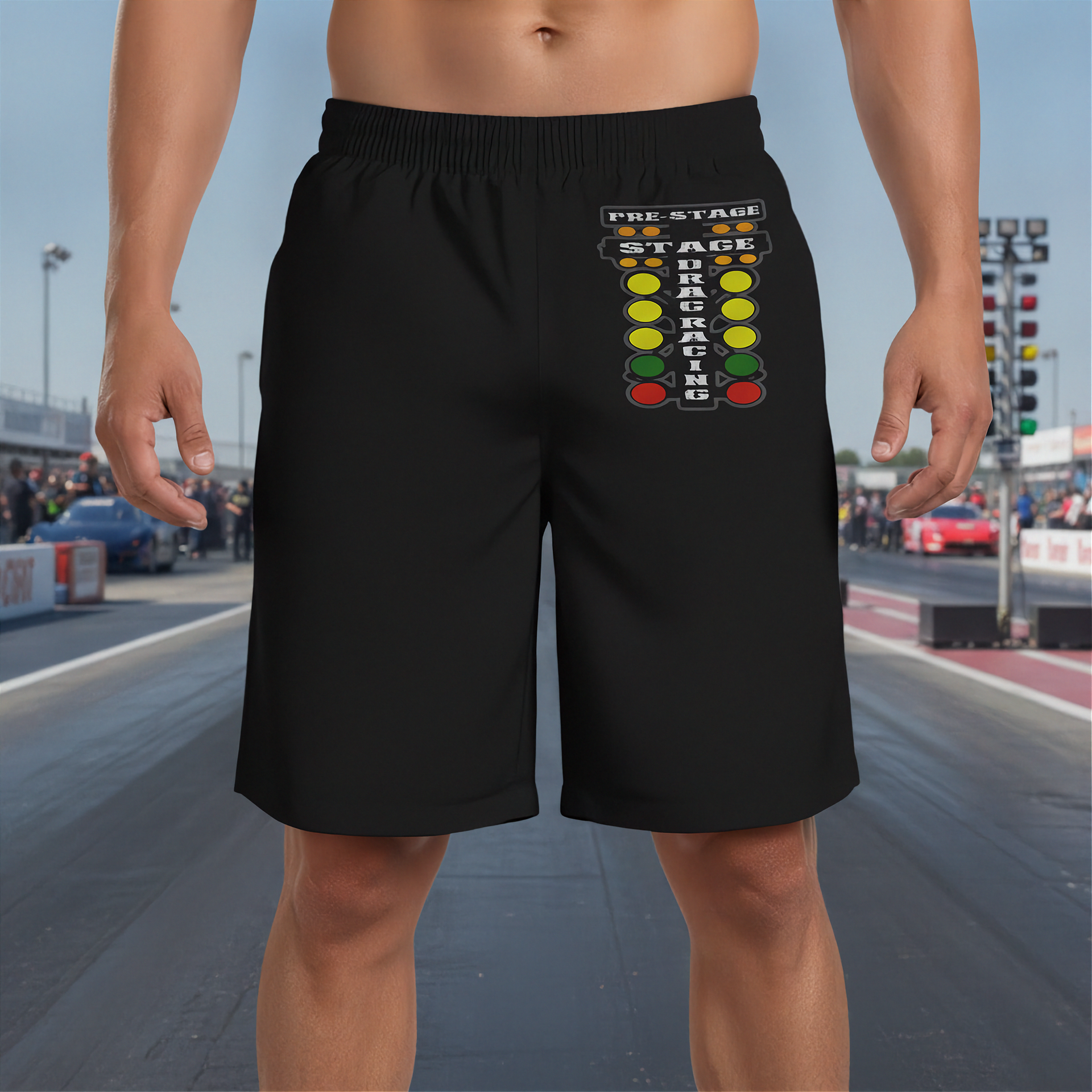 Black athletic shorts with a colorful 'Pre-Stage Race Track Lights' graphic on the left leg, modeled on a person standing on a racetrack.
