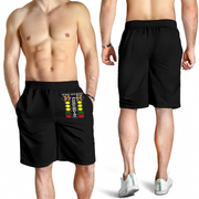 Black athletic shorts shown on a male model from both front and back views. The front view shows a colorful vertical graphic on the left leg, while the back view shows a plain black fabric.